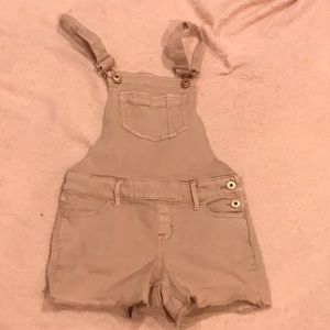 Pink denim overalls